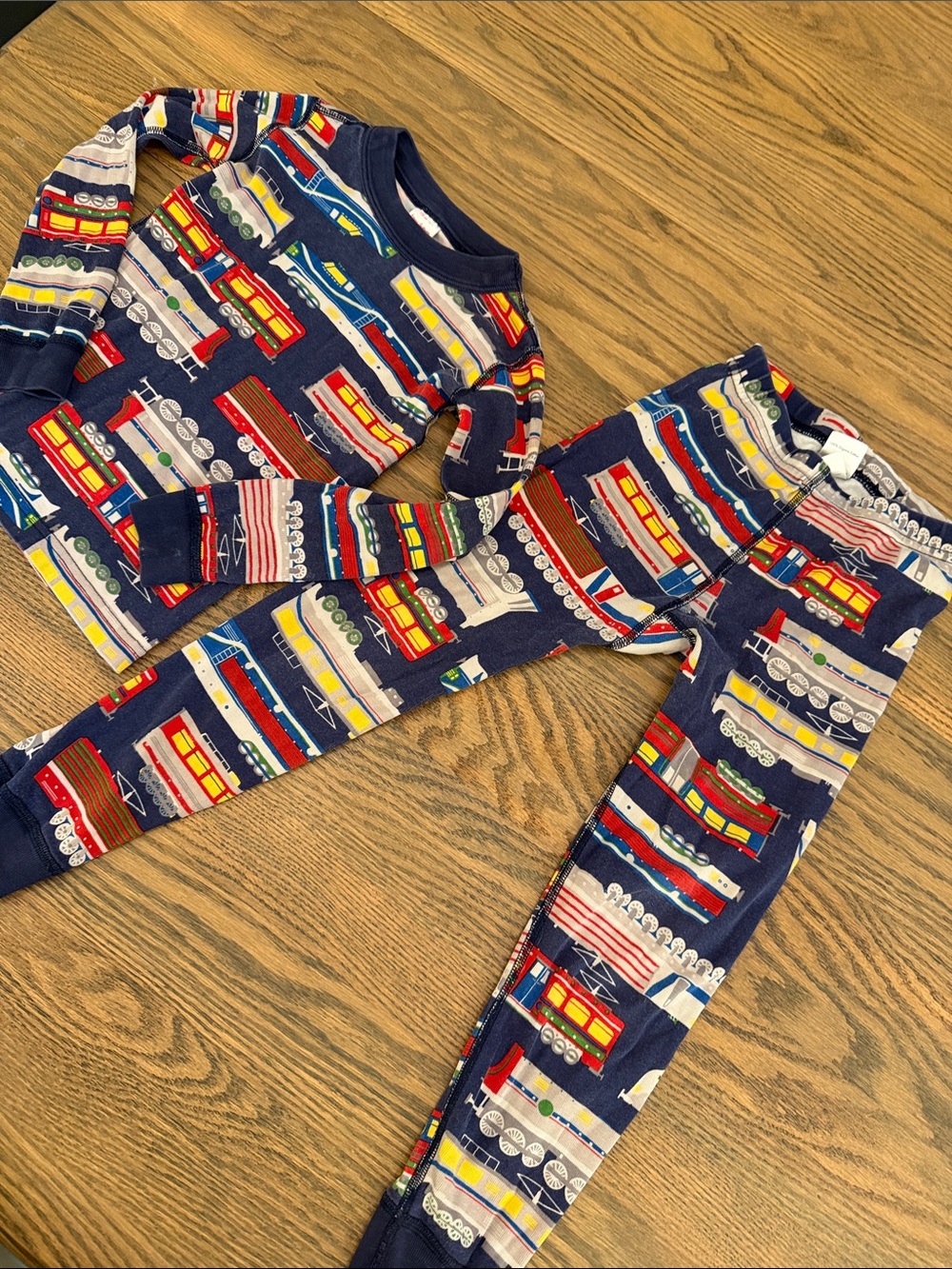 Hanna Andersson Navy Train-Print Kids Pajama Set with Red & Yellow Accents